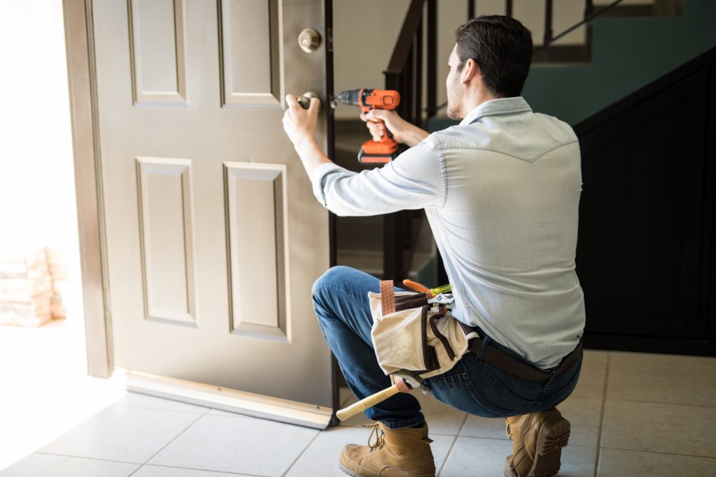 door hinges being installed