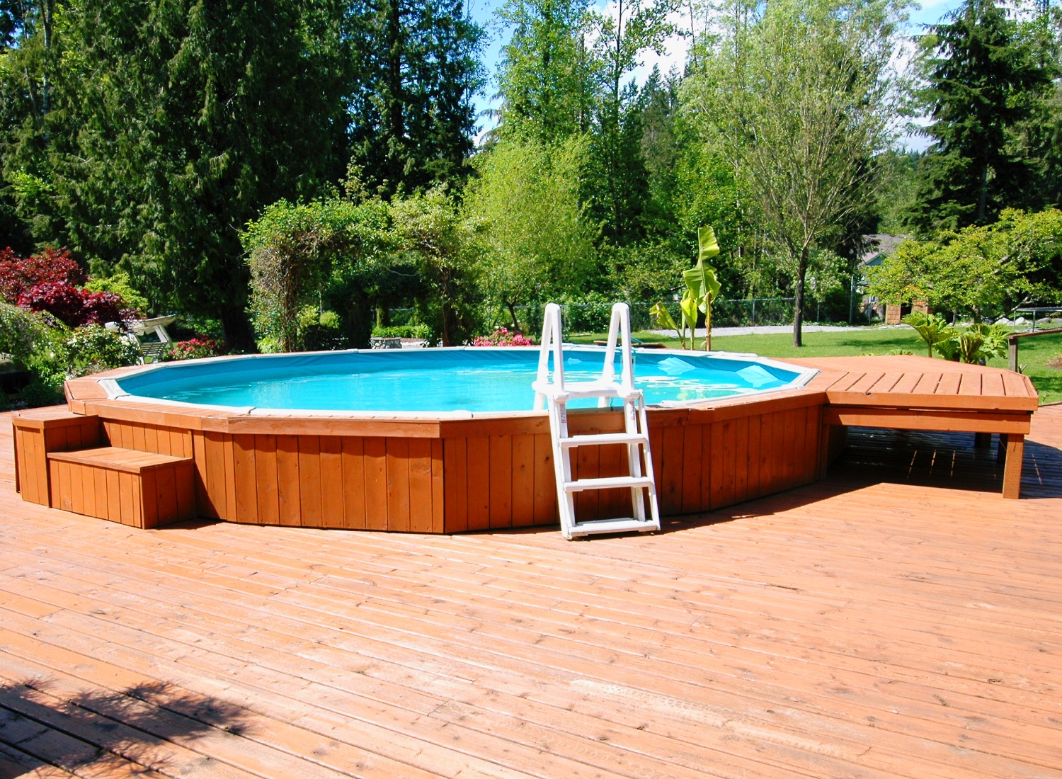 Wooden deck around an above ground pool