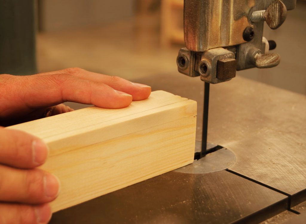 Cutting wood with a band saw